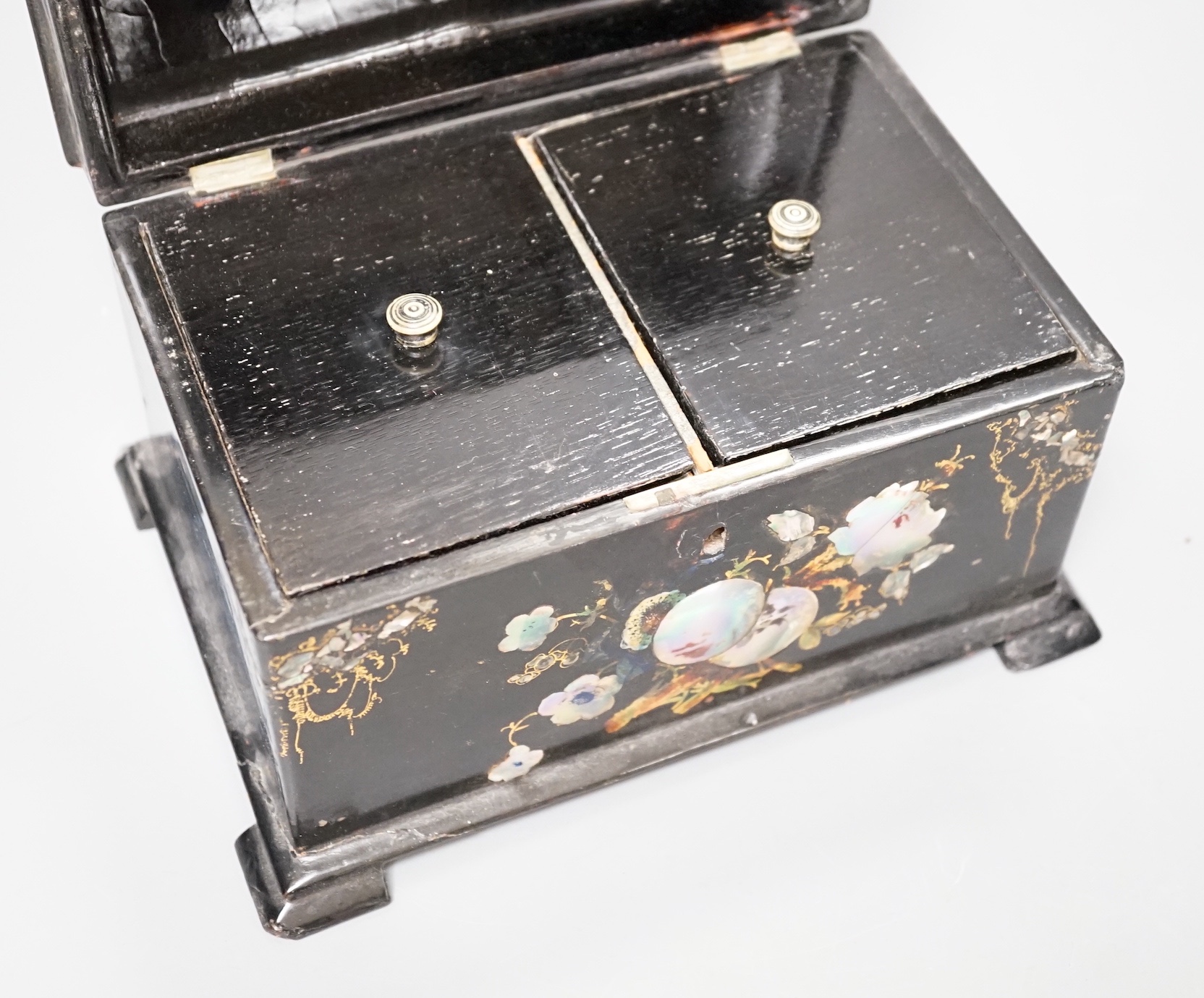 A Victorian inlaid papier mache tea caddy, 21cm wide